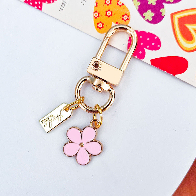 Wholesale Metal Raised Flower Keychains